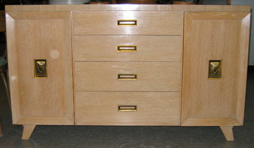 Appraisal: BLOND WOOD BUFFET with four central doors flanked by a