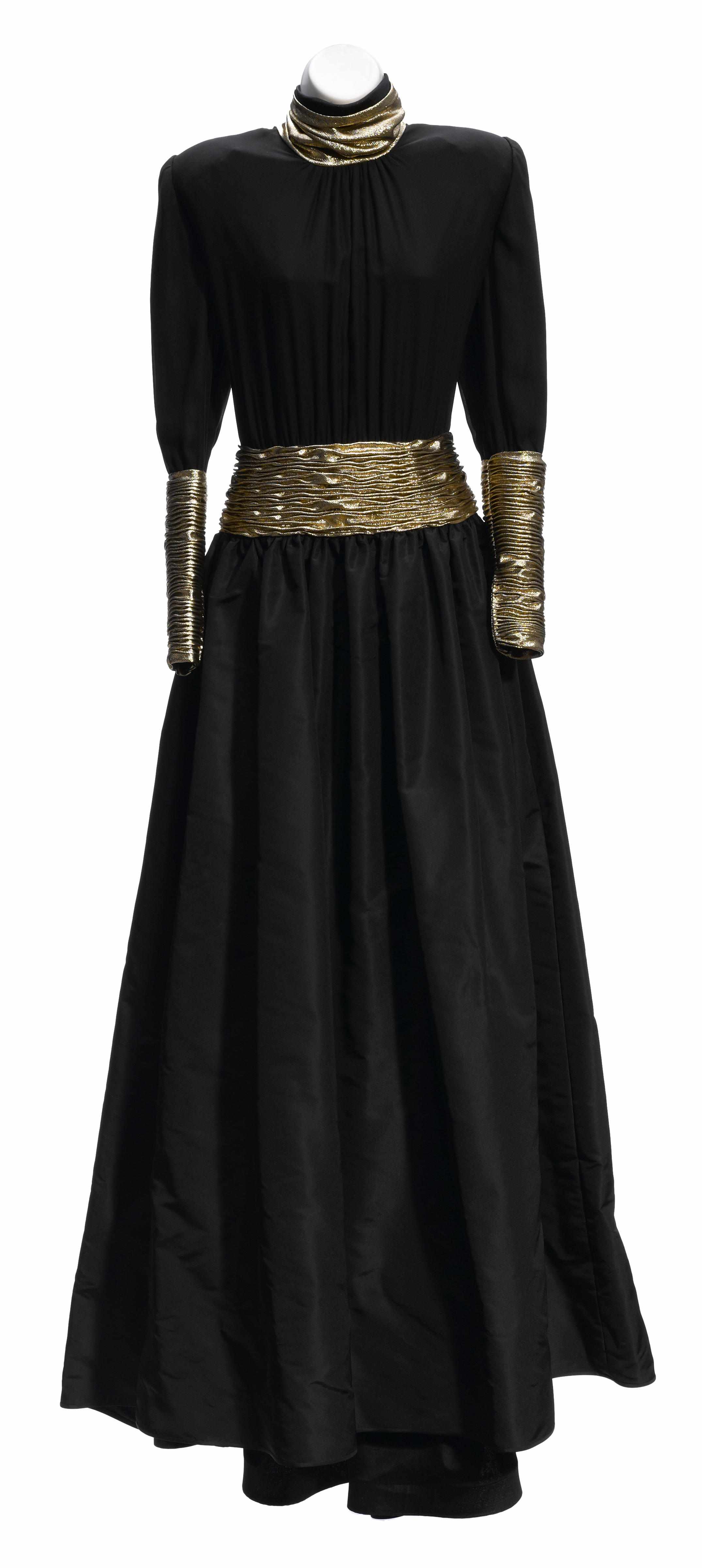 Appraisal: A Valentino black taffeta and gold lame gown size