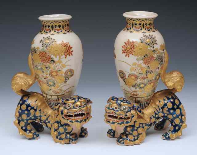 Appraisal: A PAIR OF JAPANESE SATSUMA VASES each on a kylin