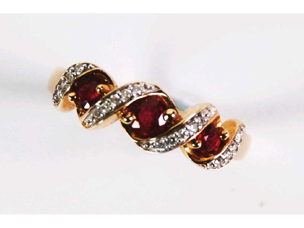 Appraisal: ct GOLD RUBY AND DIAMOND RING set with three circular