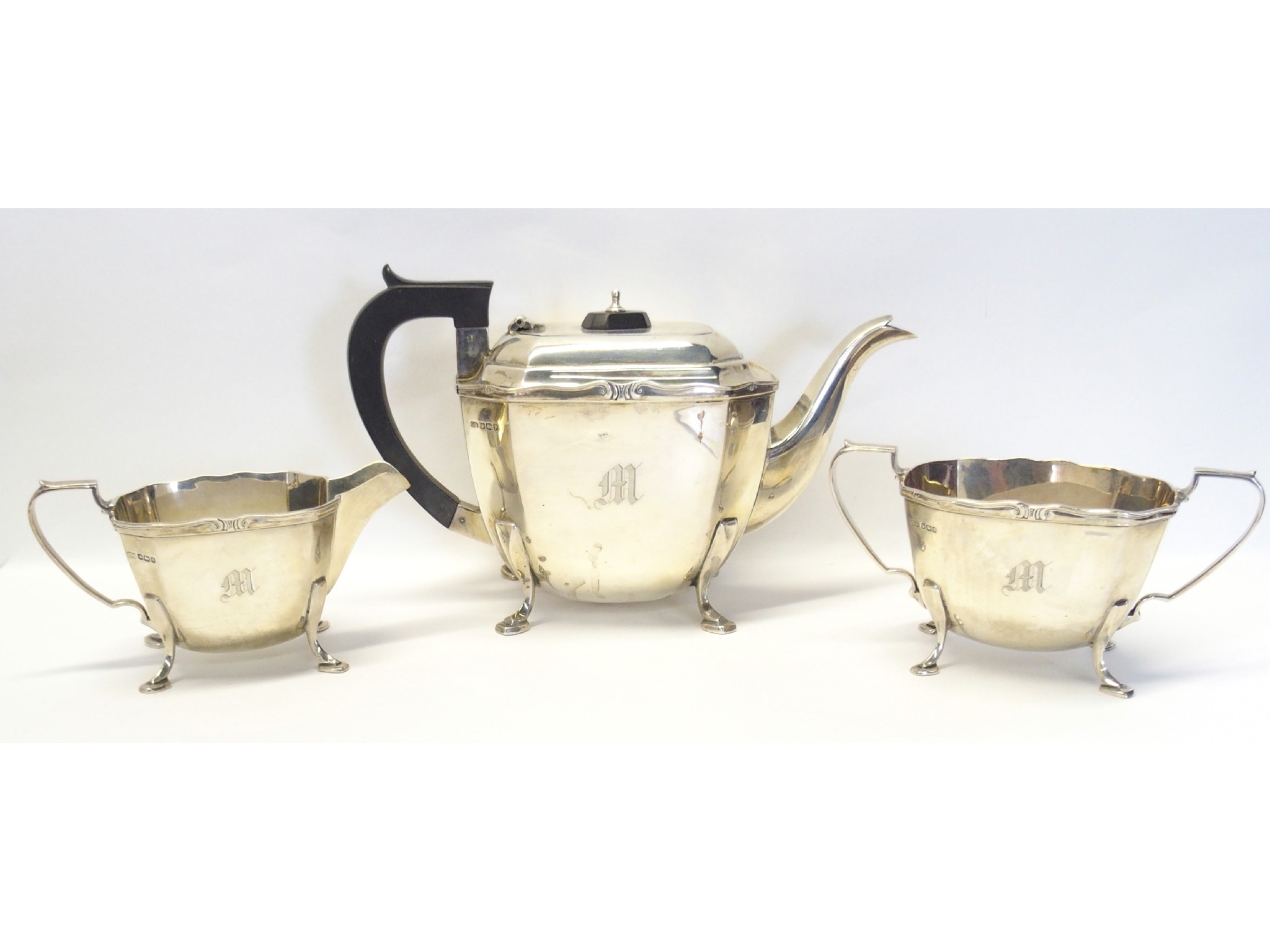 Appraisal: A three piece silver tea service Sheffield oz