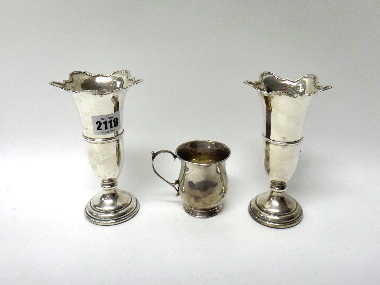 Appraisal: Silver comprising two similar vases each with a decorated shaped