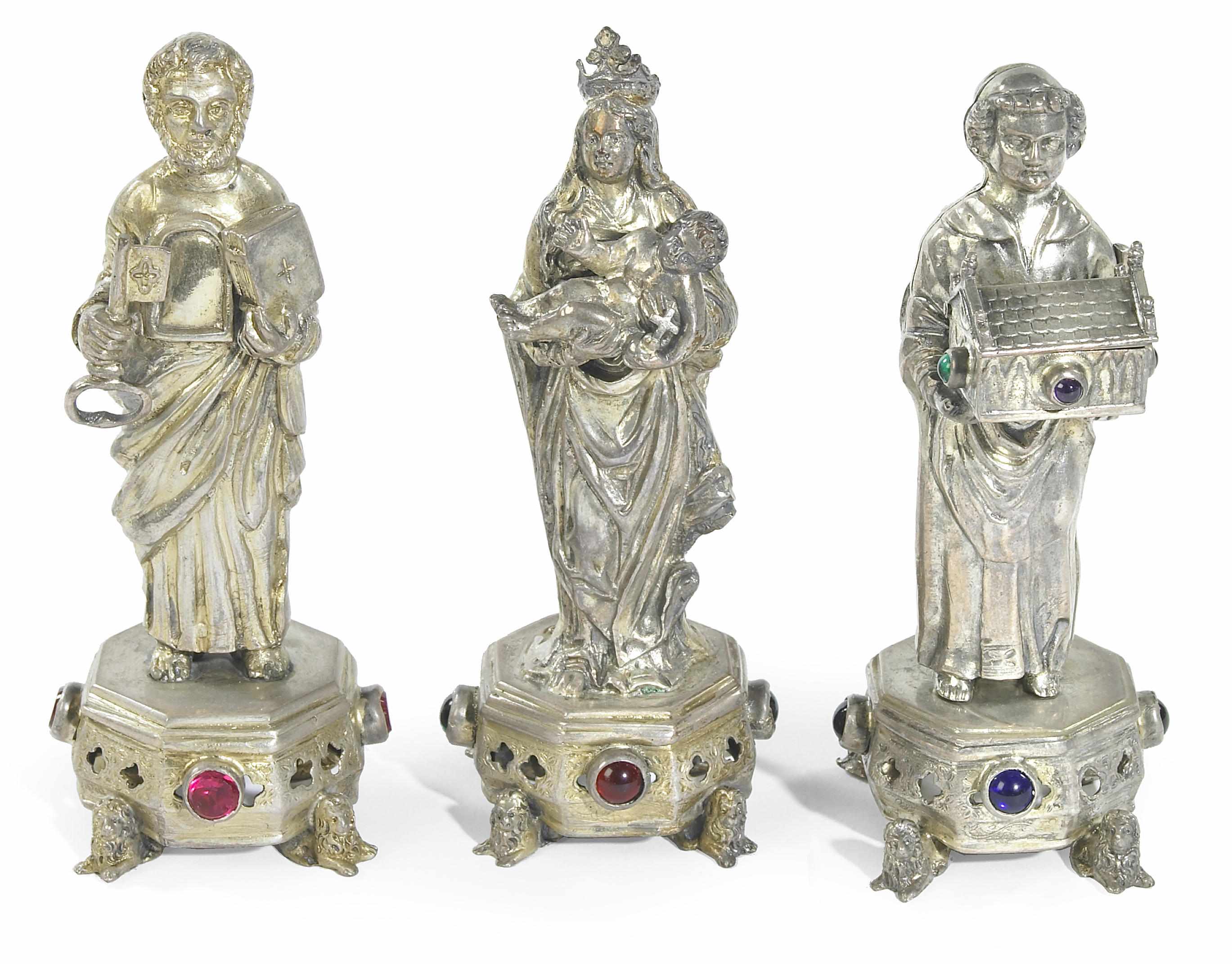 Appraisal: A German enamel silver gilt group of three similar figures