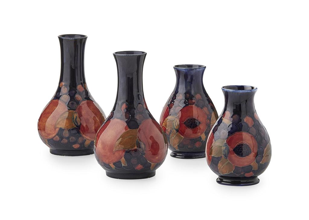 Appraisal: MOORCROFT POTTERY PAIR OF 'POMEGRANATE' PATTERN BALUSTER VASES CIRCA impressed