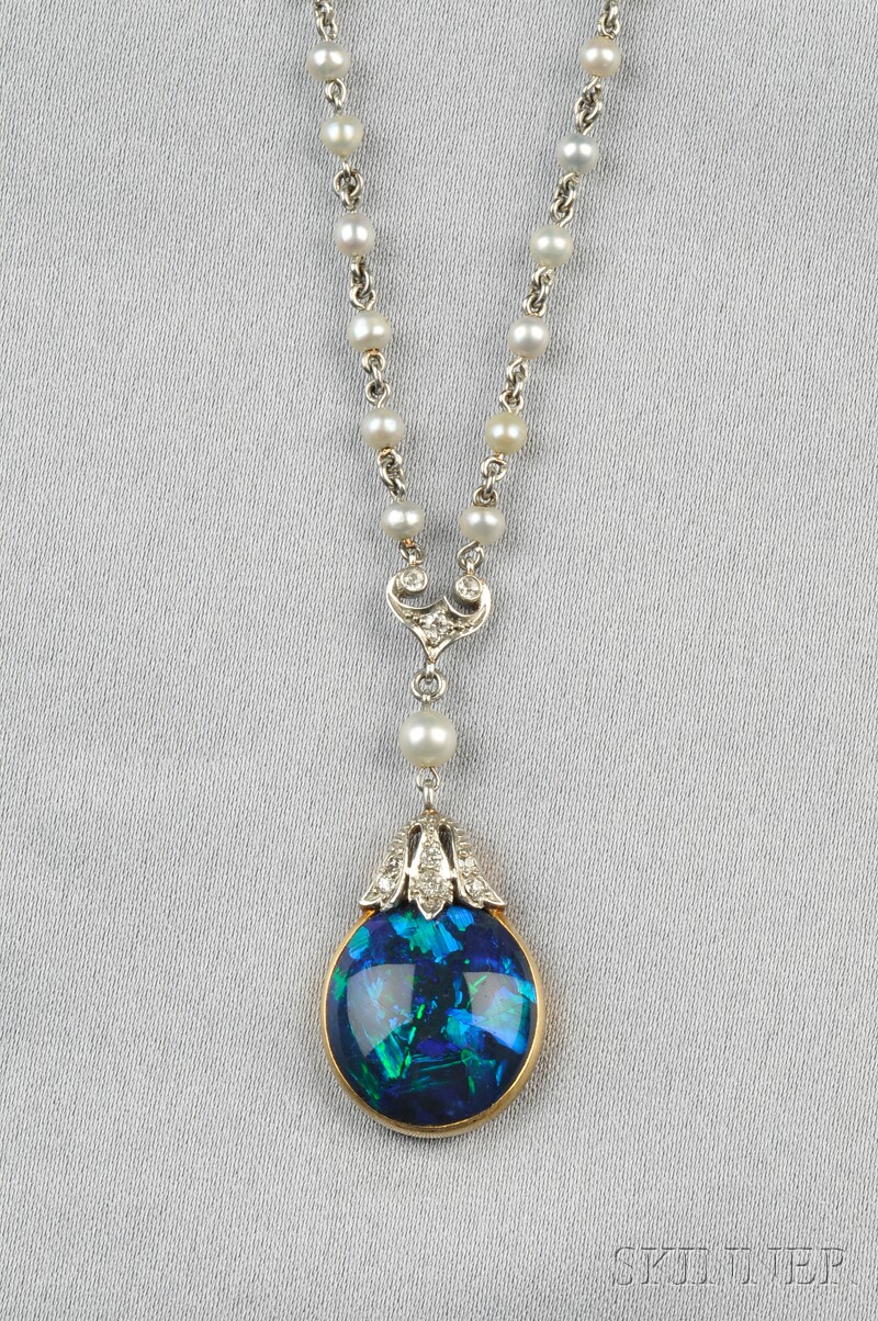 Appraisal: Edwardian Black Opal Pendant bezel-set with a cabochon opal measuring