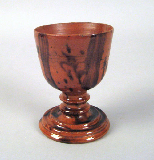 Appraisal: Pennsylvania redware chalice th c with beaded and incised bands