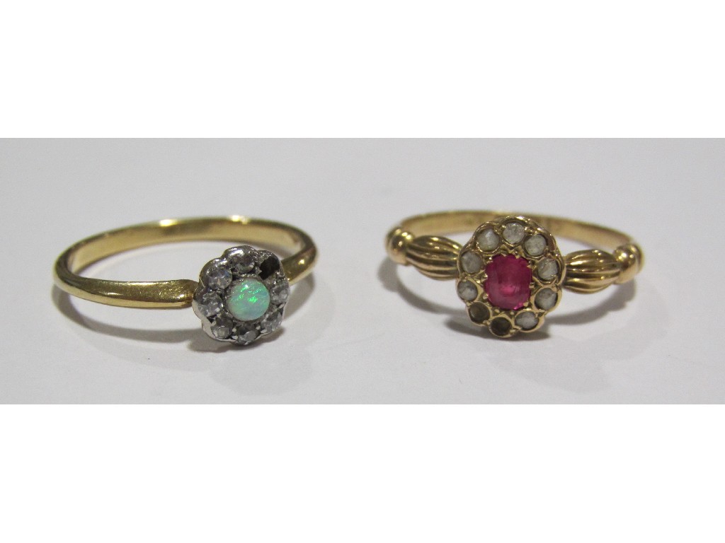 Appraisal: Lot comprising an ct gold ruby and diamond cluster ring