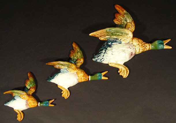 Appraisal: Graduated set of three Beswick mallard wall plaques with hand