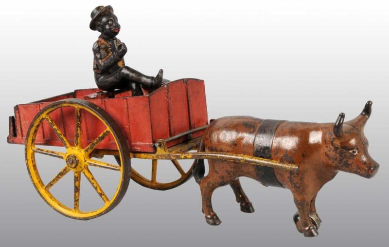 Appraisal: Cast Iron Hubley Horse-Drawn Ox Cart Toy Description Cart has