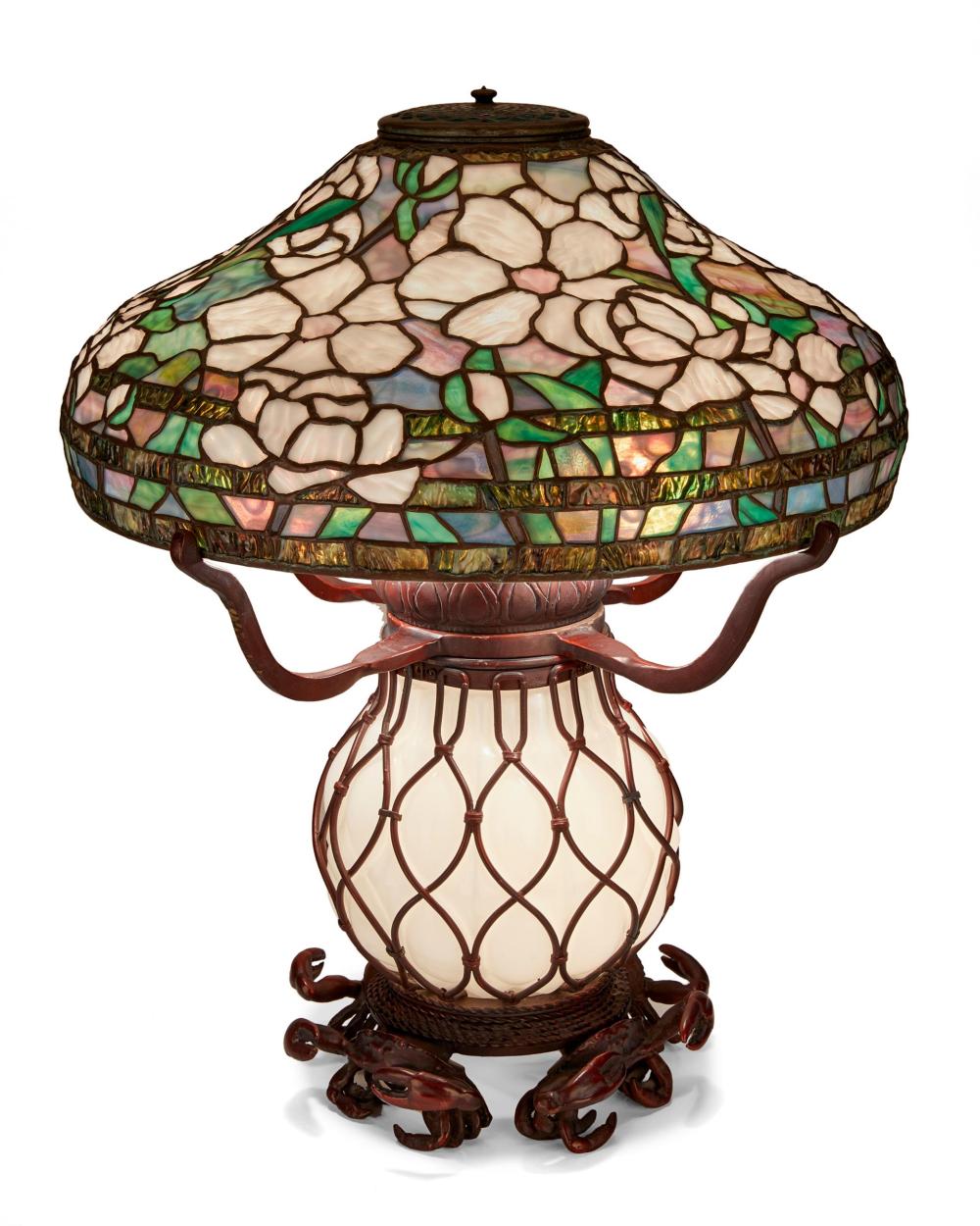 Appraisal: A Tiffany-style leaded glass table lamp th Century Shade signed