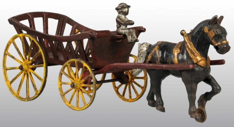 Appraisal: Cast Iron Kenton Plantation Cart Toy Description Pulled by a