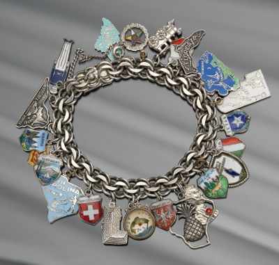 Appraisal: A Sterling Silver Charm Bracelet Sterling silver double curb link