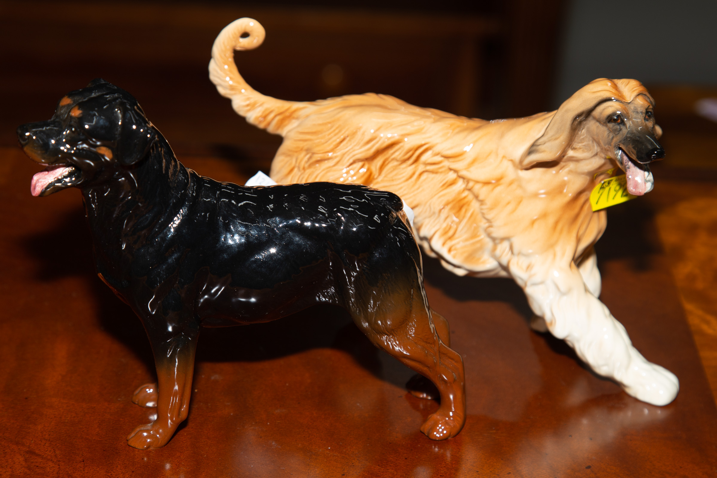 Appraisal: TWO ROYAL DOULTON CHINA DOGS Includes a Afghan Hound and