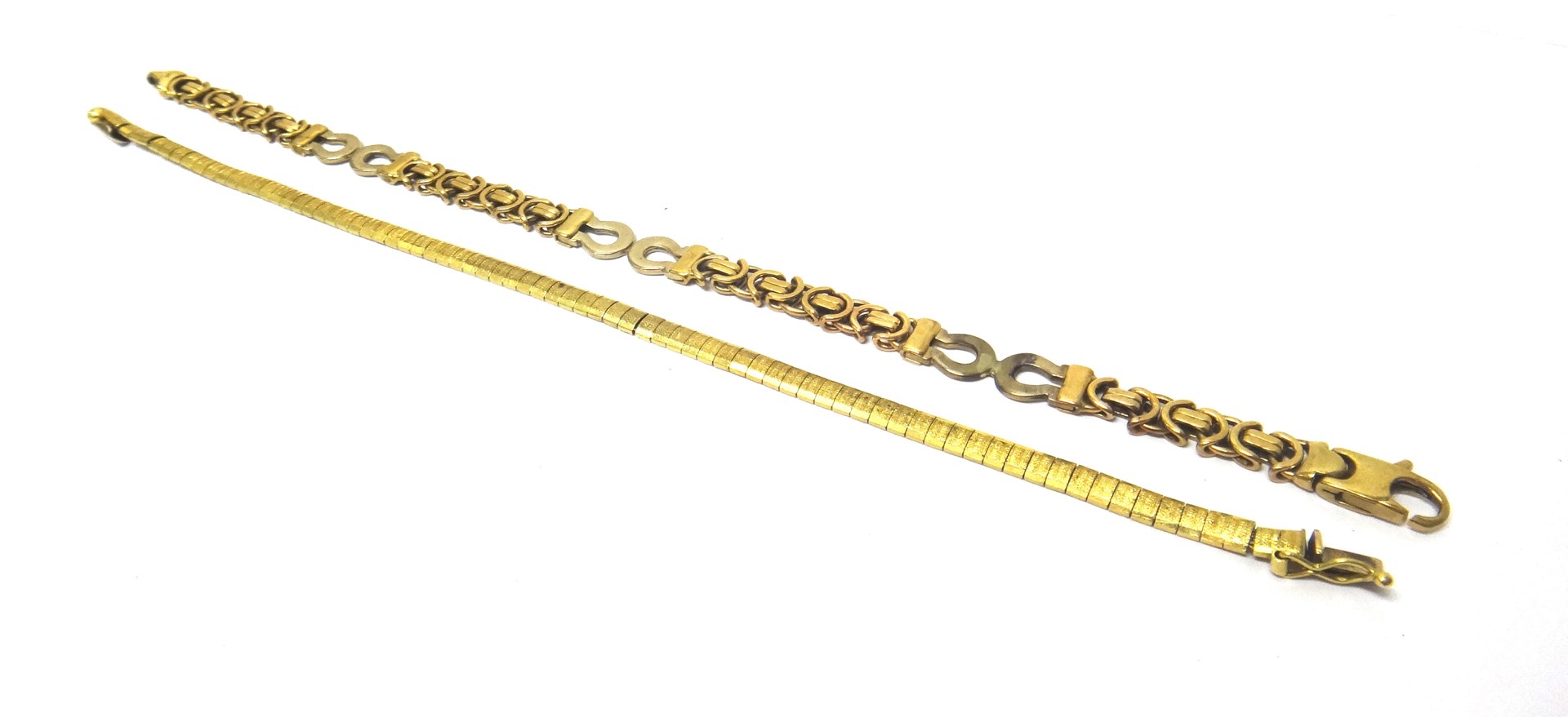 Appraisal: A ct two colour gold bracelet in an interwoven and