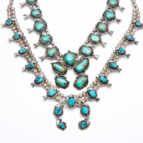 Appraisal: NATIVE AMERICAN Two silver squash blossom necklaces with turquoise One