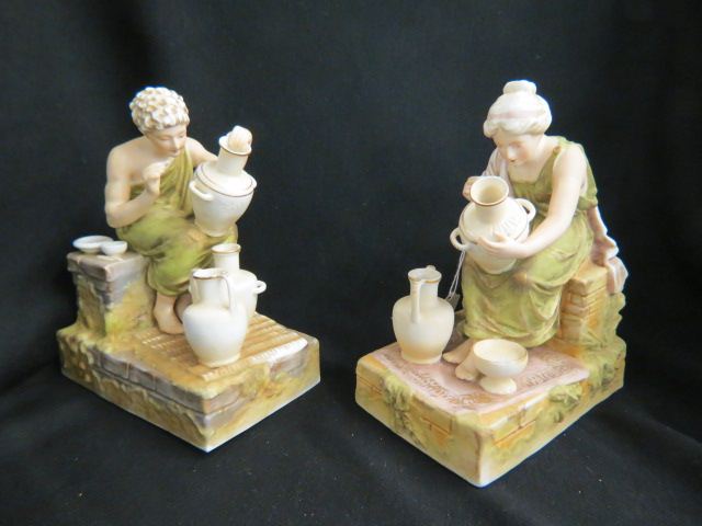 Appraisal: Pair of Figural Porcelain Bookends porcelain decantor seated with vases