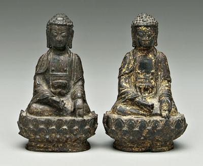 Appraisal: Two Chinese bronze Buddhas each seated in vajrasana pose on