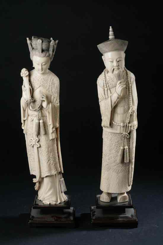 Appraisal: PAIR CHINESE IVORY FIGURES OF EMPEROR AND EMPRESS Late th