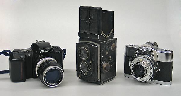 Appraisal: An assembled grouping of cameras and lenses Including makers Voigh