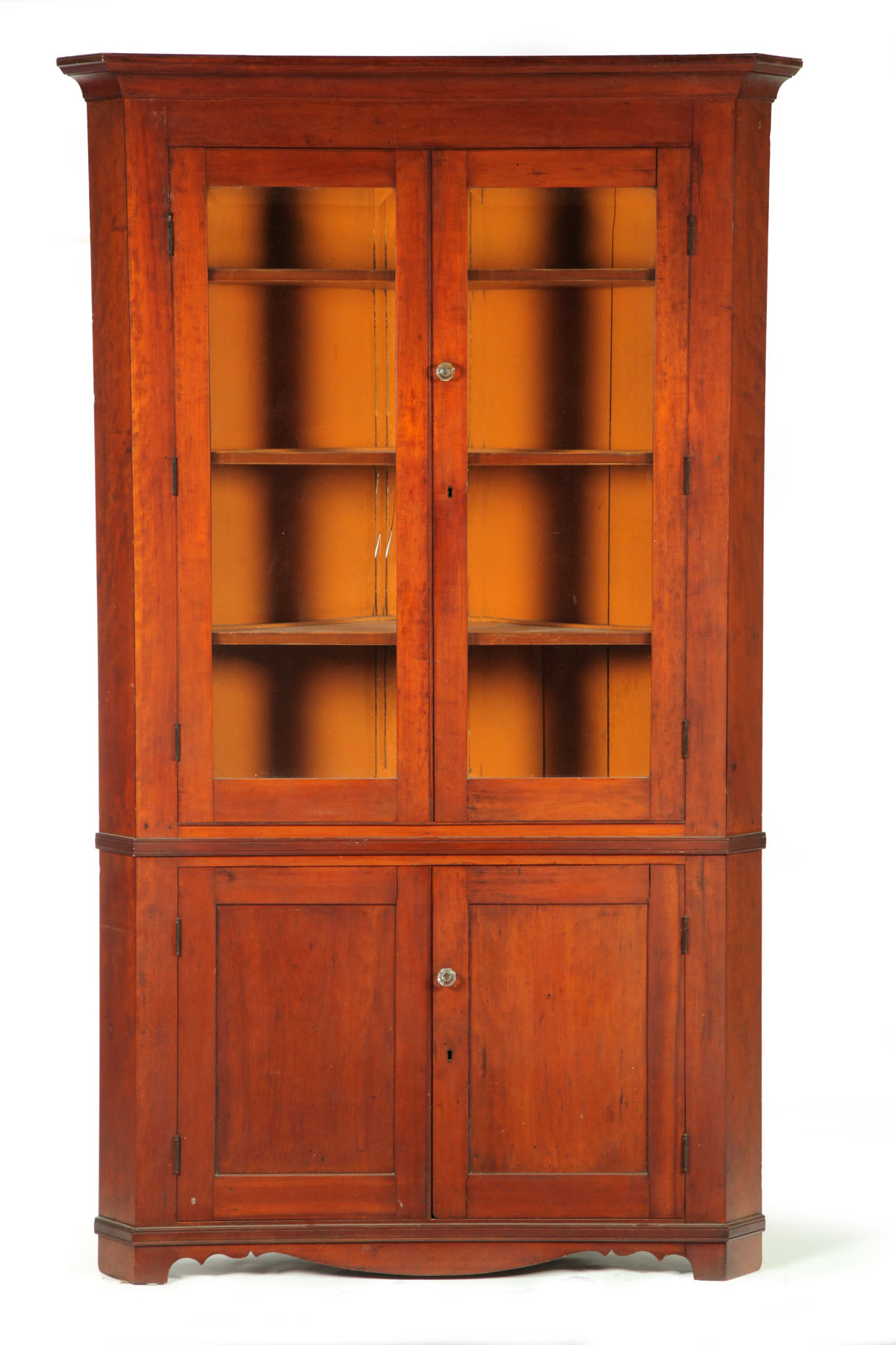 Appraisal: CORNER CUPBOARD American th century cherry and poplar One-piece the