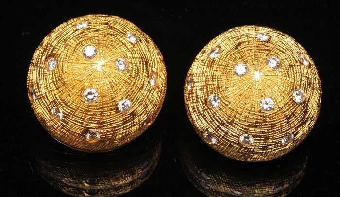 Appraisal: PAIR OF GOLD AND DIAMOND DOME EARRINGS Stamped approx in