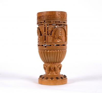 Appraisal: A Russian harvest vase the rim inscribed and with carved