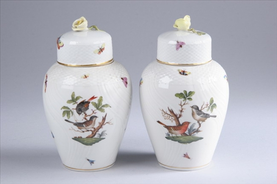 Appraisal: PAIR HEREND PORCELAIN LIFT-TOP OVOID TEA CADDIES Rothschild Bird pattern