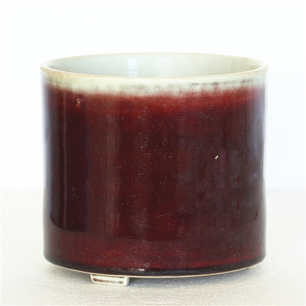 Appraisal: Chinese ox blood red glaze brush pot with Kangxi mark