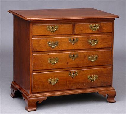 Appraisal: PENNSYLVANIA CHIPPENDALE WALNUT CHEST OF DRAWERS Molded overhang top with