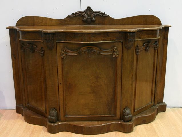 Appraisal: A Victorian walnut three door credenza cm wide cm deep