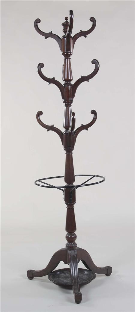 Appraisal: A th century mahogany coatstand the vase turned column mounted