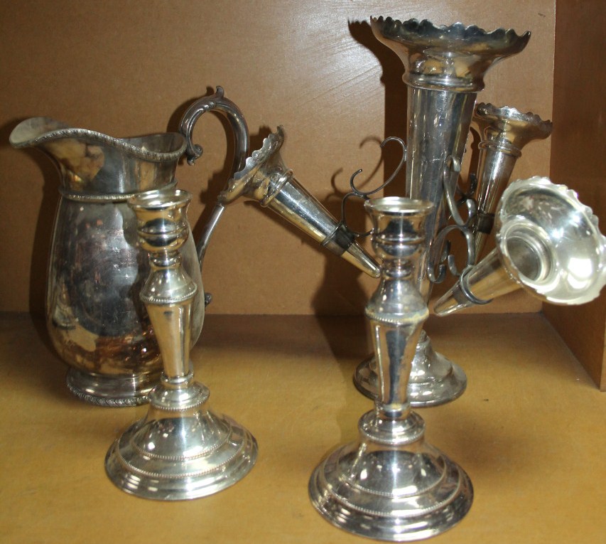 Appraisal: An early thC silver plated epergne with four trumpet stems