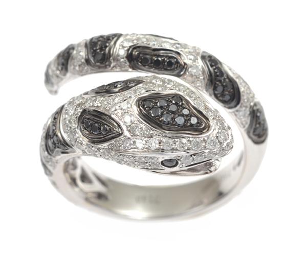 Appraisal: A BLACK AND WHITE DIAMOND SNAKE RING