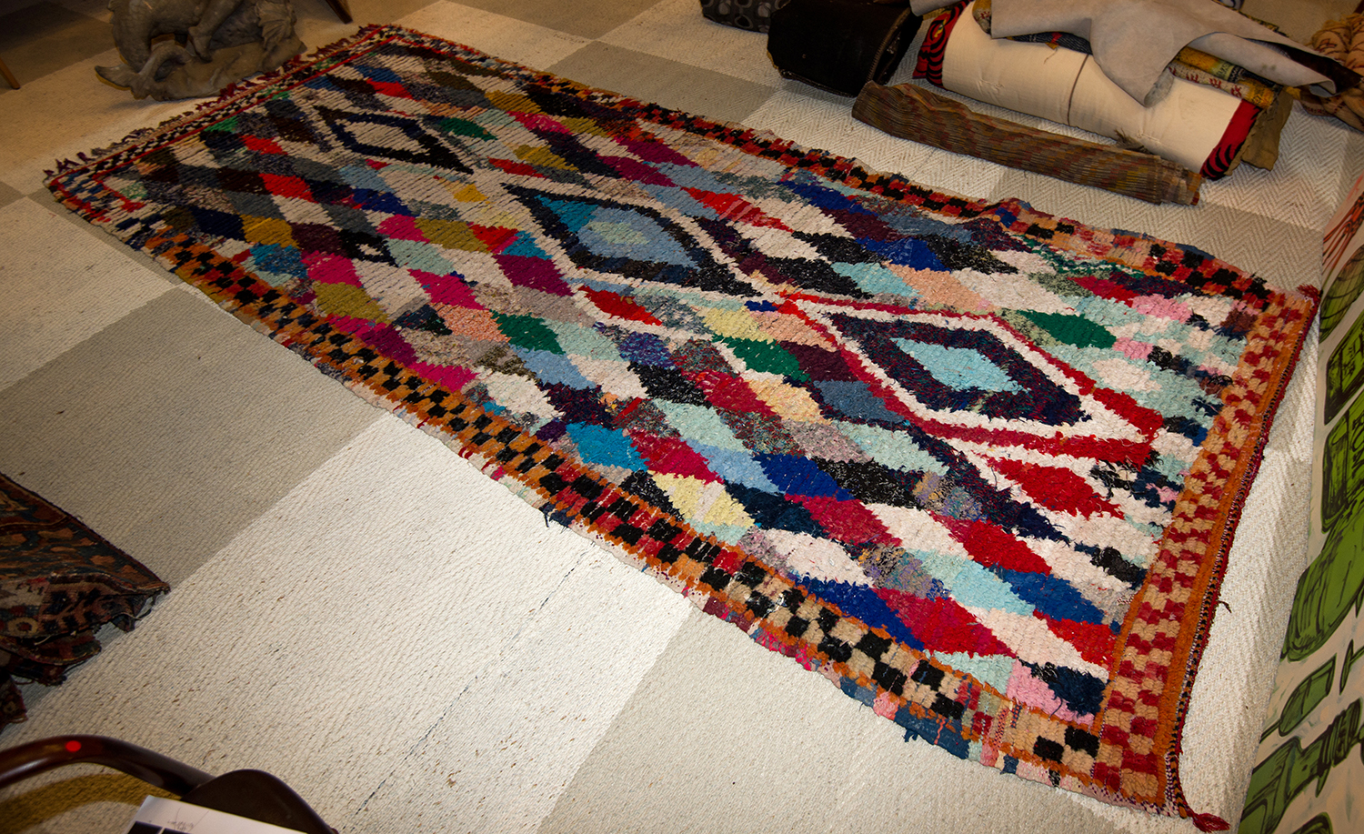 Appraisal: A COLOURFUL DIAMOND PATTERNED BOUCHEROUITE RUG x cm