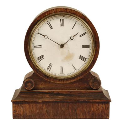 Appraisal: A rosewood 'tic-tac' mantel clock with an day movement stamped