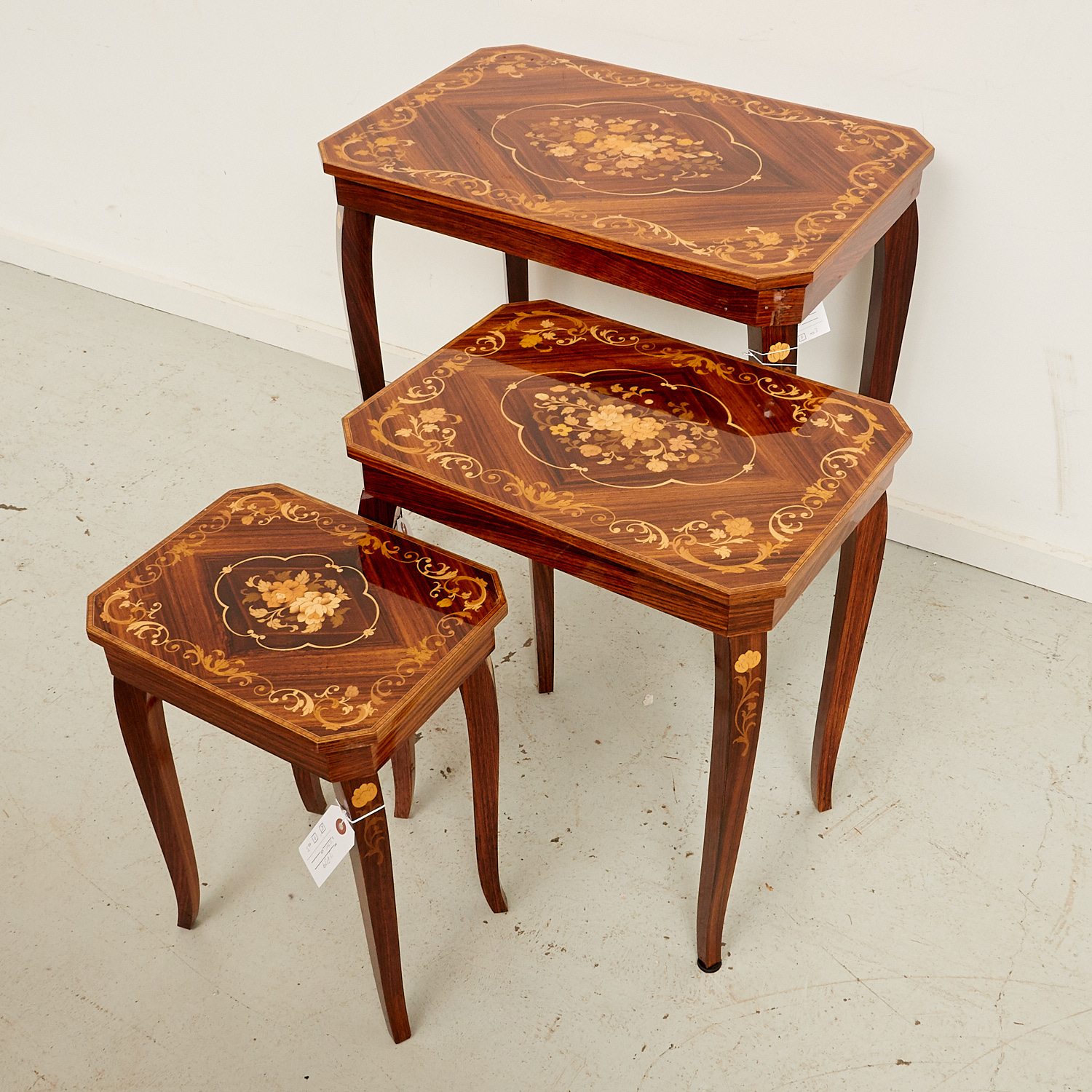 Appraisal: SET ITALIAN INLAID NESTING TABLES th c Sorrento floral and