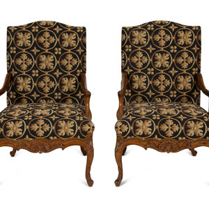 Appraisal: A Pair of R gence Style Upholstered Fauteuils th Century