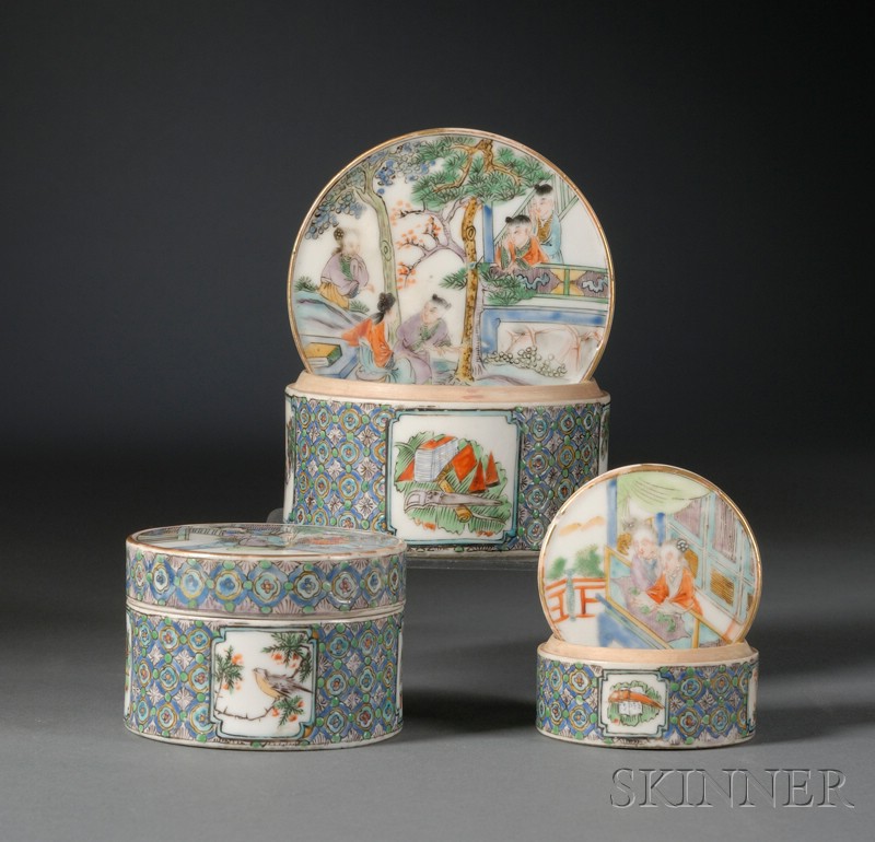 Appraisal: Three Porcelain Nesting Boxes China th century famille rose scenes