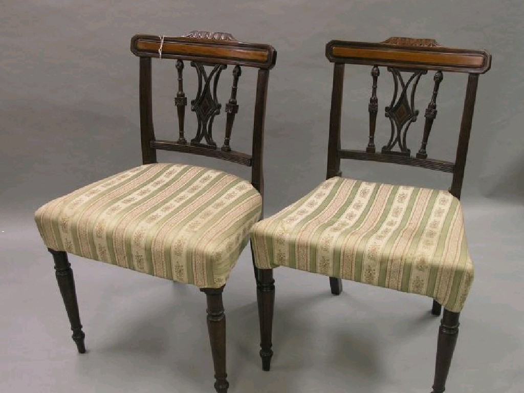 Appraisal: A pair of George III mahogany dining chairs overhanging top