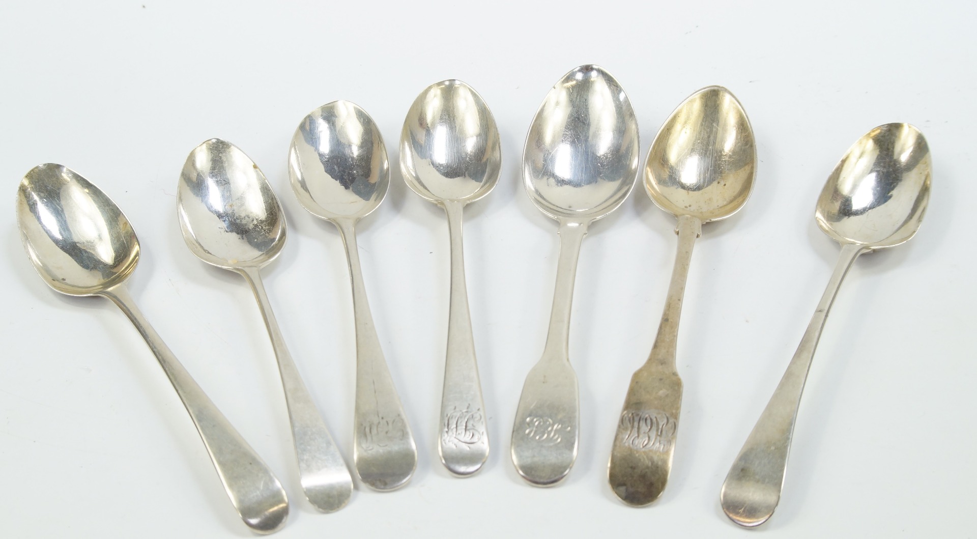 Appraisal: A set of four Victorian silver dessert spoons decorated in