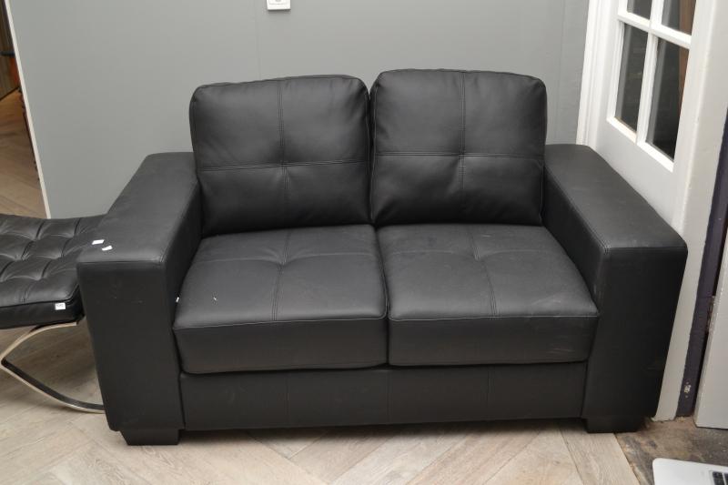 Appraisal: A CONTEMPORARY TWO SEAT BLACK LEATHER SOFA