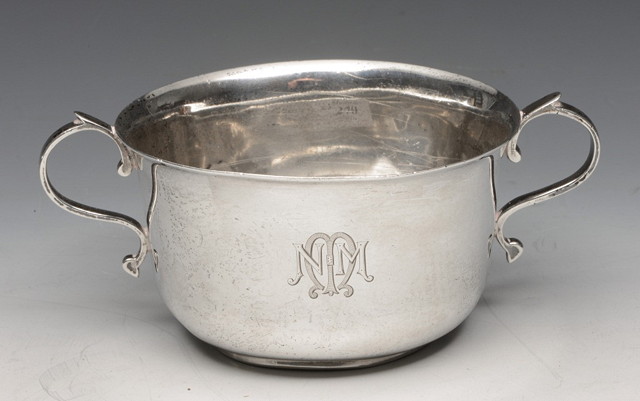 Appraisal: A GEORGIAN STYLE SILVER BOWL of circular form with shaped