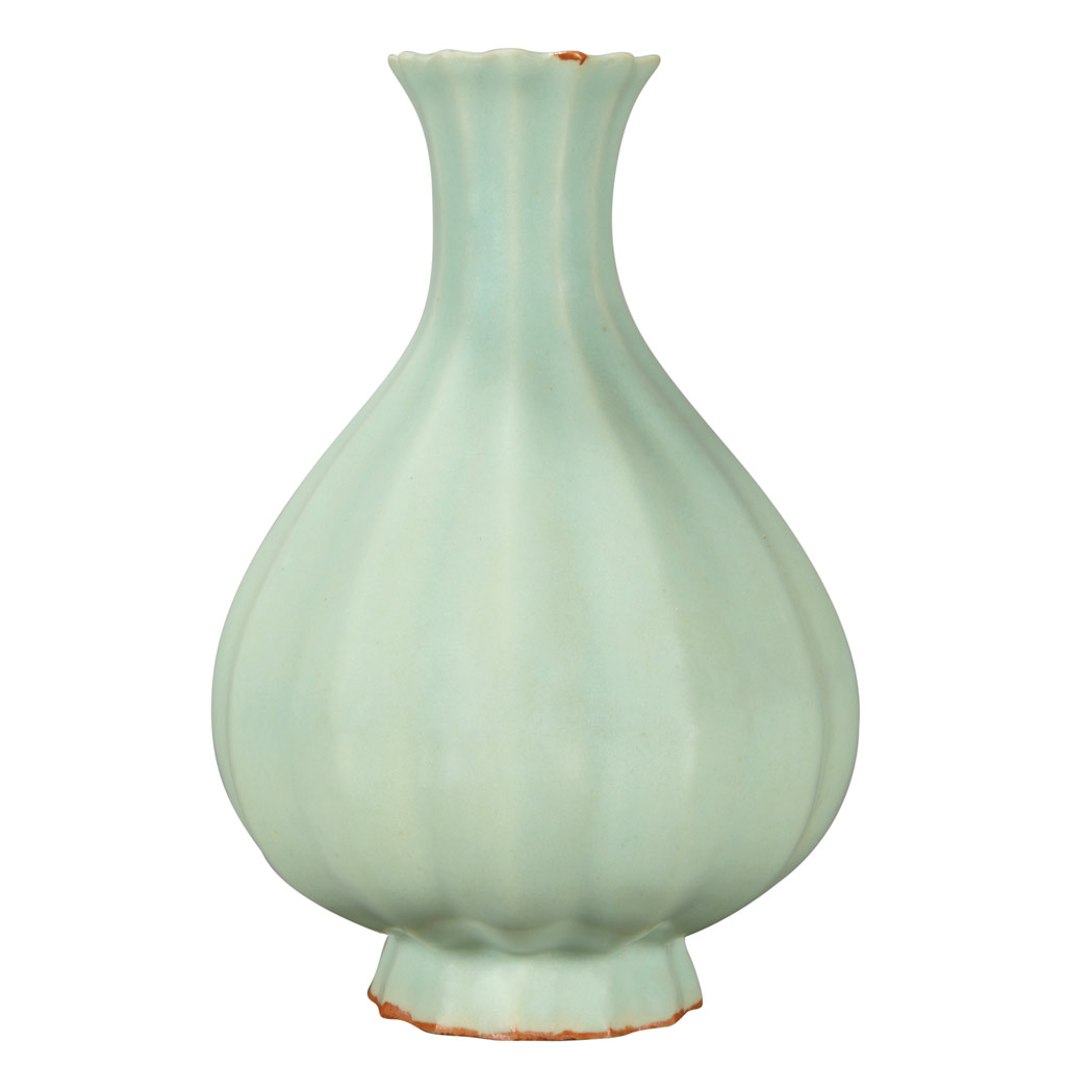 Appraisal: Chinese Celadon Glazed Porcelain Vase th Century The pear-shaped ribbed