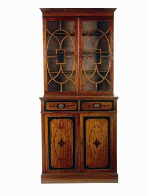 Appraisal: A mahogany bookcase cabinet inlaid stringing and with simulated banding