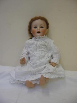 Appraisal: An F W Goebel bisque head girl doll repaired with