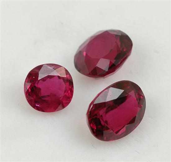 Appraisal: Three loose rubies Comprising an oval cut ruby weighing cts