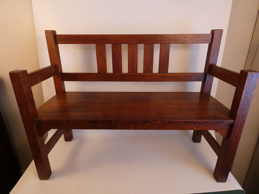 Appraisal: QUAINT OAK A C BENCH Antique solid oak Arts and