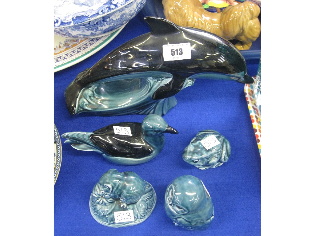 Appraisal: Lot comprising a Poole dolphin and four other Poole animal