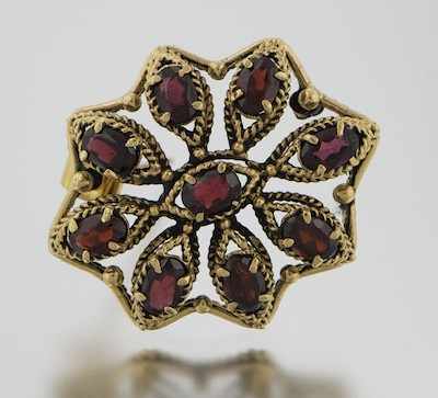 Appraisal: A Ladies' Gold and Garnet Brooch k yellow gold brooch