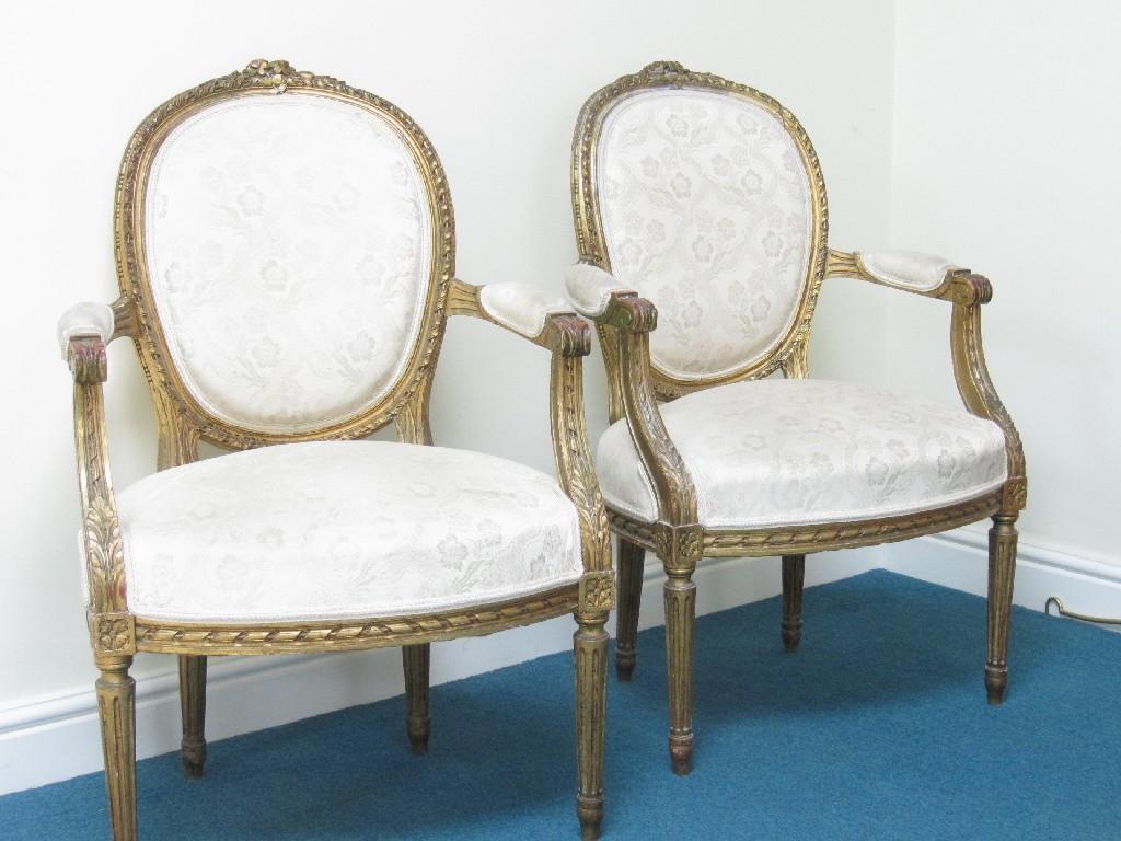 Appraisal: Pair of th Century French gilt Elbow Chairs with floral